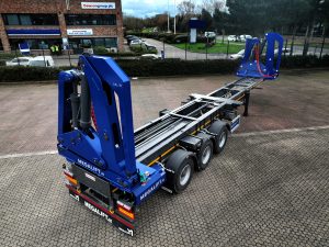 DVSA article - Megalift crane truck in car park in front of Dawsongroup building