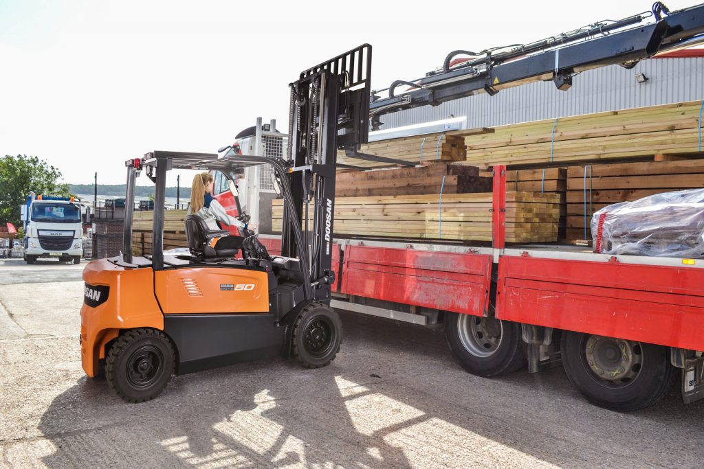 Doosan B50X forklift truck moving timber