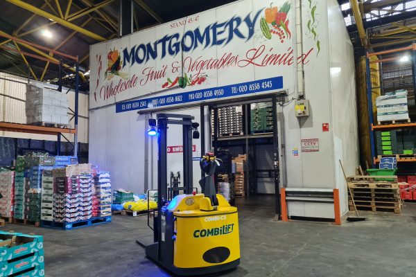 Combilift in front of Montgomery sign
